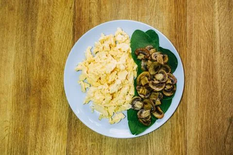 Scramble eggs served for breakfast Stock Photos