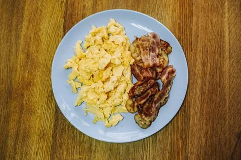 Scramble eggs served for breakfast Stock Photos