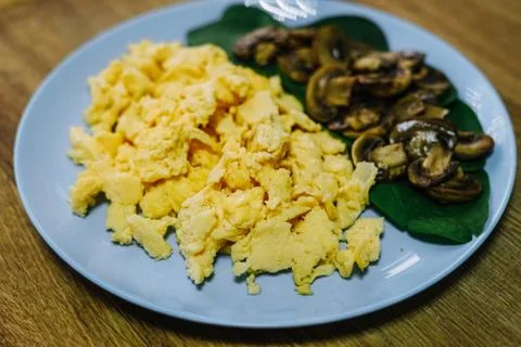 Scramble eggs served for breakfast Stock Photos