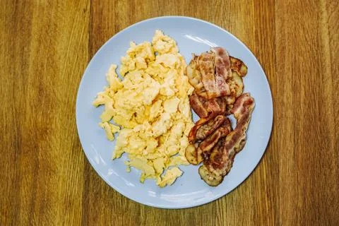 Scramble eggs served for breakfast Stock Photos