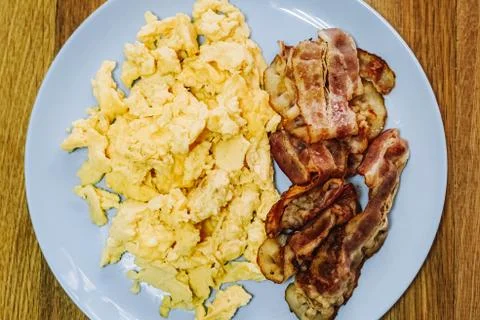 Scramble eggs served for breakfast Stock Photos