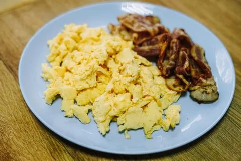 Scramble eggs served for breakfast Stock Photos