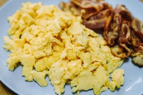 Scramble eggs served for breakfast Stock Photos