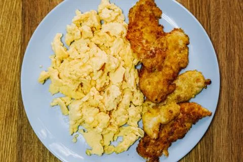 Scramble eggs served for breakfast Stock Photos