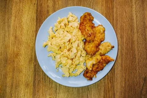 Scramble eggs served for breakfast Stock Photos