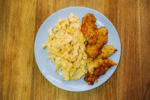 Scramble eggs served for breakfast Stock Photos