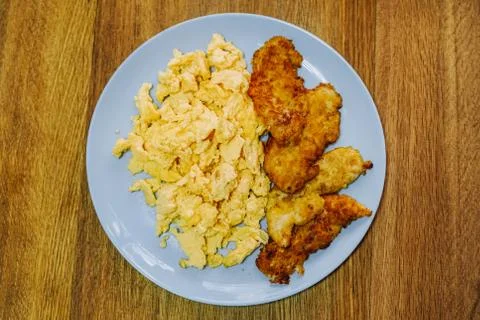 Scramble eggs served for breakfast Stock Photos