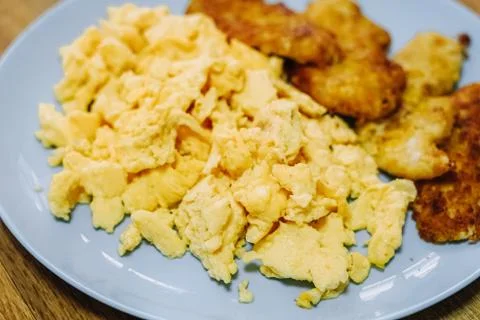 Scramble eggs served for breakfast Stock Photos