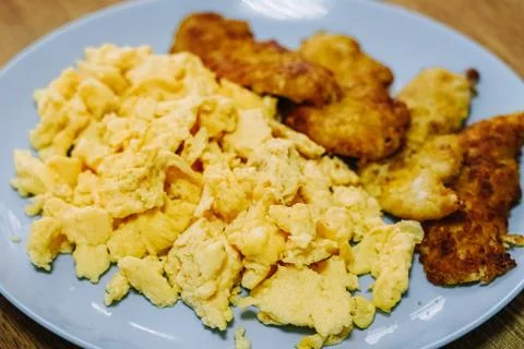 Scramble eggs served for breakfast Stock Photos