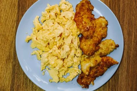 Scramble eggs served for breakfast Stock Photos