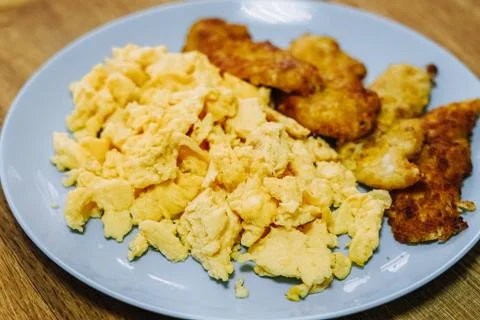 Scramble eggs served for breakfast Stock Photos