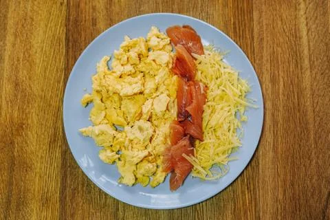 Scramble eggs served for breakfast Stock Photos