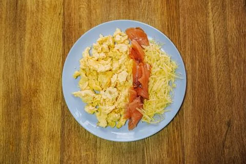 Scramble eggs served for breakfast Stock Photos