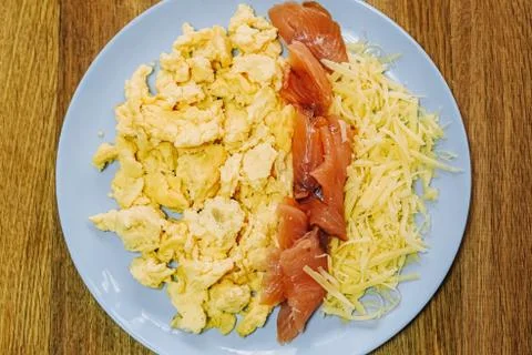 Scramble eggs served for breakfast Stock Photos