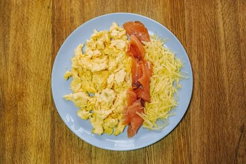 Scramble eggs served for breakfast Stock Photos