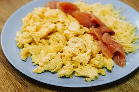Scramble eggs served for breakfast Stock Photos