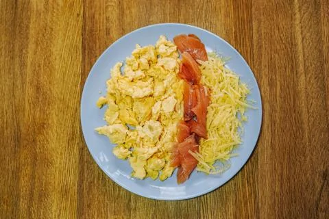 Scramble eggs served for breakfast Stock Photos