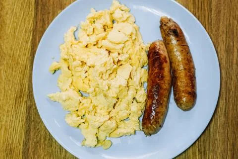 Scramble eggs served for breakfast Stock Photos