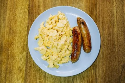 Scramble eggs served for breakfast Stock Photos