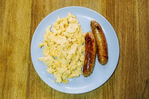 Scramble eggs served for breakfast Stock Photos
