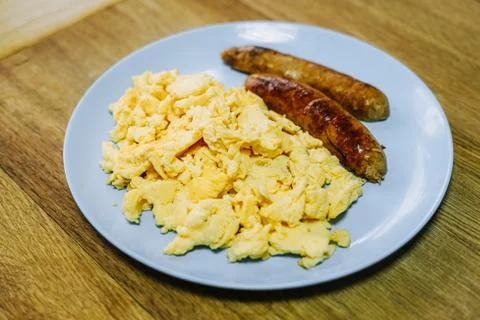 Scramble eggs served for breakfast Stock Photos