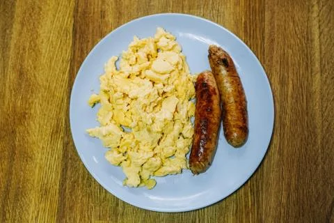 Scramble eggs served for breakfast Stock Photos