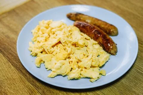 Scramble eggs served for breakfast Stock Photos