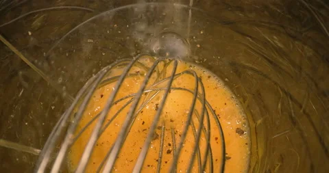 Scrambled Egg - Add Pepper and Whisk Stock Footage 148192738
