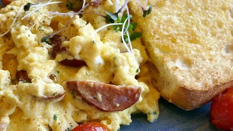 Scrambled egg with sausage Stock Footage 76272936