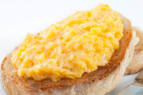 Scrambled egg on toast Stock Photos
