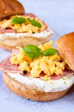 Scrambled eggs and ham Stock Photos