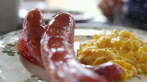 Scrambled eggs and sausage Stock Footage 64658218