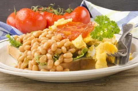 Scrambled eggs with baked beans Stock Photos