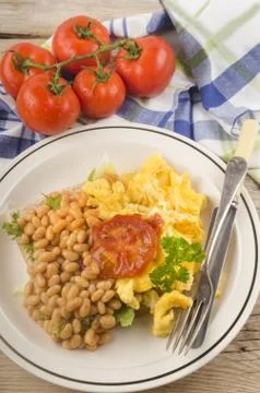 Scrambled eggs with baked beans Stock Photos