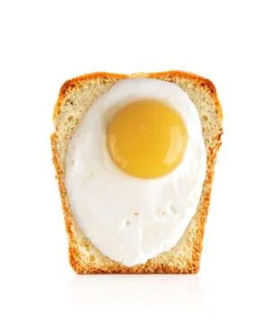 Scrambled eggs on bread isolated on white Foto stock