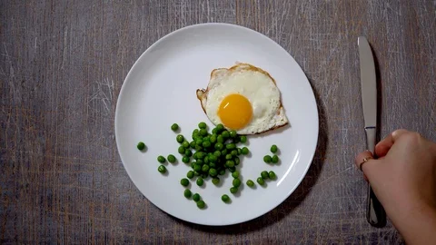 Scrambled eggs, food; background; hand; kitchen; breakfast; white; eating;cooked Stock Footage 101024405