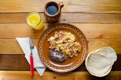 Scrambled eggs with ham Stock Photos
