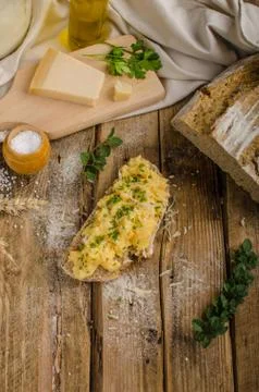 Scrambled eggs on homemade bread Stock Photos