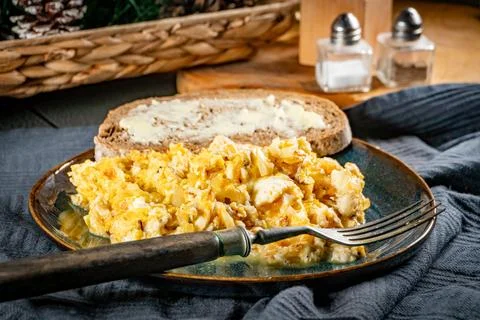 Scrambled eggs with onion. Stock Photos