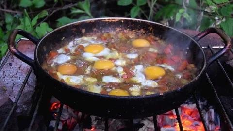 Scrambled Eggs on Open Fire Stock Footage 159804114