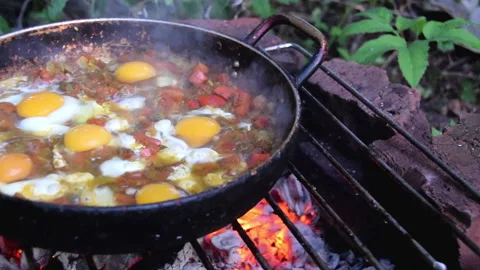 Scrambled Eggs on Open Fire Stock Footage 159804140