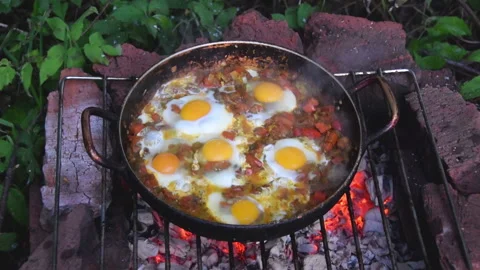 Scrambled Eggs on Open Fire Stock Footage 159804202