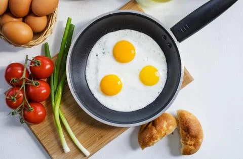 Scrambled Eggs on a Pan Stock Photos
