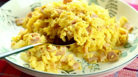 Scrambled eggs on plate,  close up in studio Chiangmai Thailand. Stock Footage 166391371