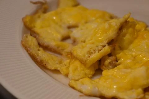 Scrambled eggs on a plate Stock Photos