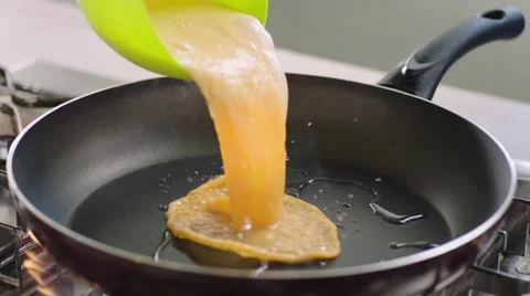 Scrambled eggs preparation in slow motion Stock Footage 46492501