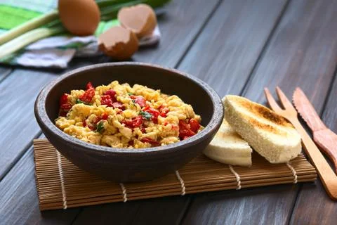 Scrambled Eggs with Red Pepper and Green Onion Stock Photos