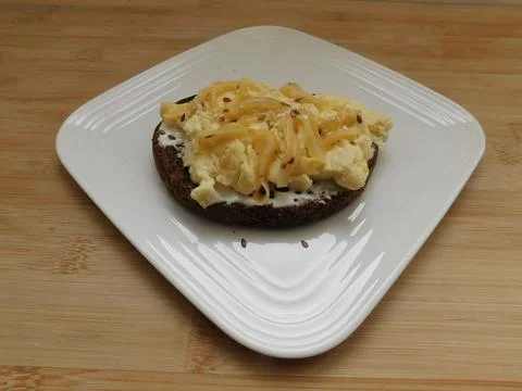 Scrambled Eggs on toasted bread for healthy breakfast or brunch, top view Foto stock