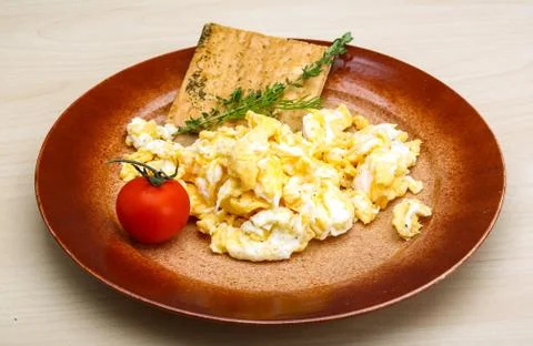 Scrambled eggs with tomato Stock Photos