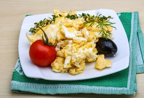 Scrambled eggs with tomato Stock Photos